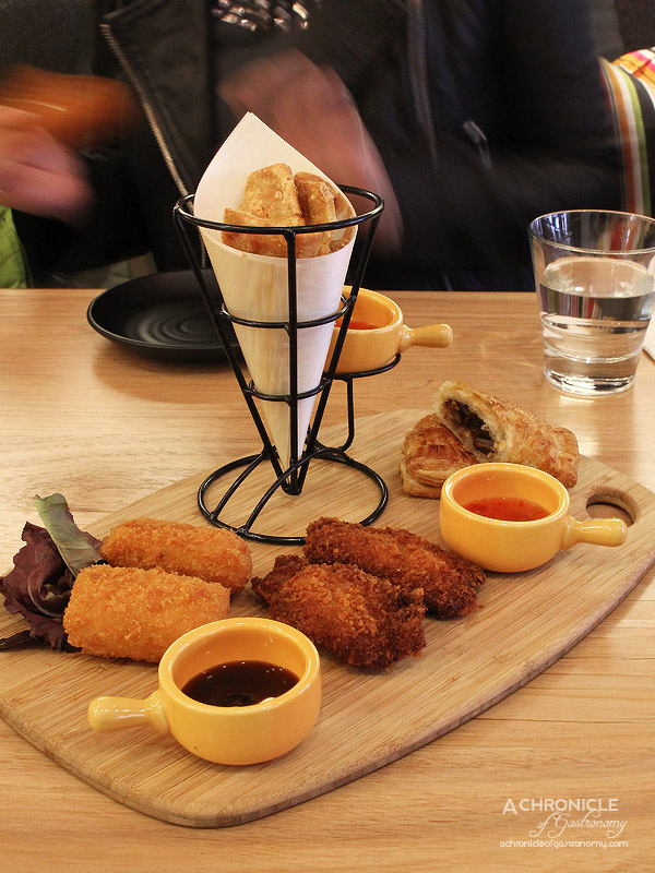 12's Cafe - Potato Pocket-Crispy potato croquette filled with crab meat, corn and creamy sauce; Chicken Ribs-Panko crumbed crunchy chicken spare ribs; Crackling Crackle-Roast pork crackling chips