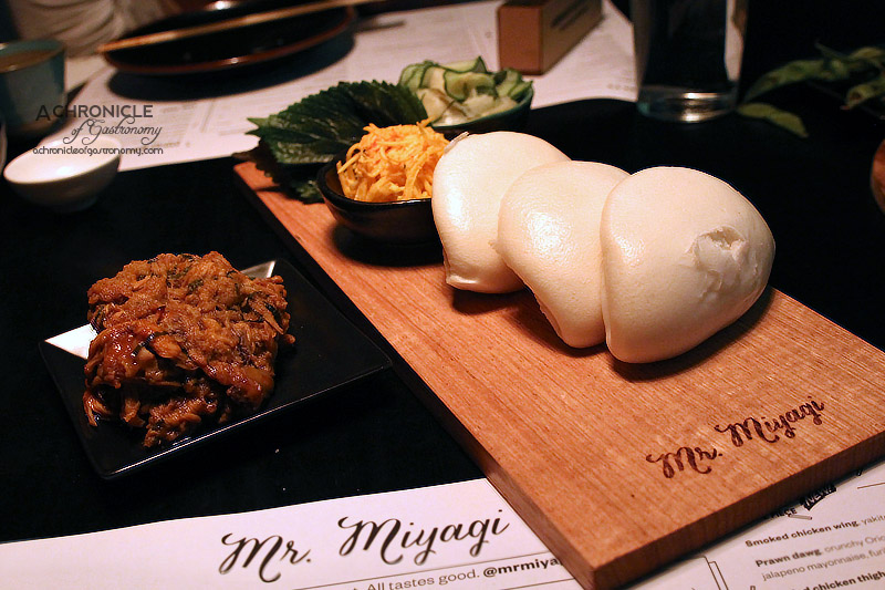 Mr Miyagi - Nikuman Steamed Pork Bun Bao Bun, 12hr Pulled Pork, Pickled Butternut Squash, Cucumber, Ginger, Korean BBQ Sauce ($22 For 3 Buns)
