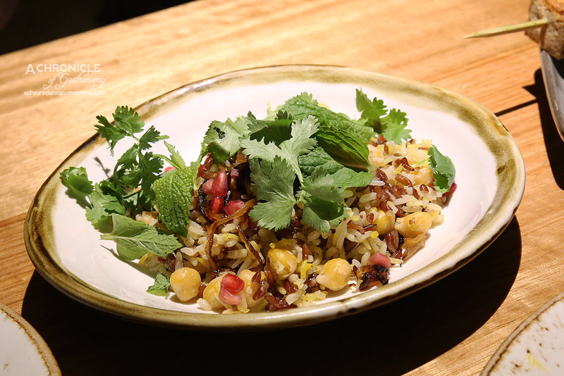 Transformer - Three Rice Pilaf, Sprouted Lentils, Chickpeas, Pomegranat, Fried Onion ($16)