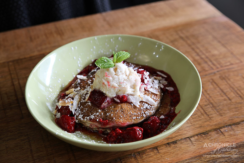 World Vegetarian Cafe - Cardamom pancakes - Buckwheat pancakes, berry compote and salted caramel vegan ice cream, pure maple syrup ($15.50)