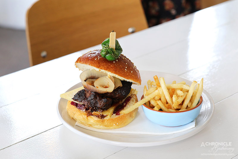 Punchbowl Canteen - Beef Cheek Burger - redkraut, emmental, pickled onions, side pedron peppers, fries ($18.50)