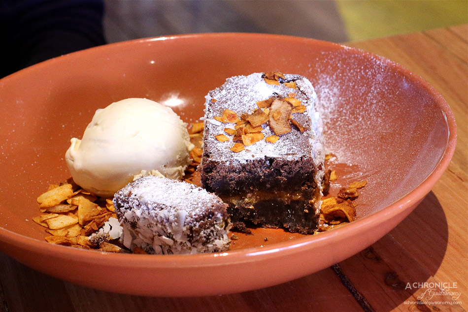 El Atino & Co - Chocolate Sweet Sin - Homemade GF Brownie filled with dulce de leche served with house-made dulce de leche ice cream and toasted coconut ($12)