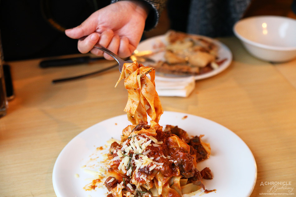 Woodfire Pizzeria - Pappardelle bolognese w slow cooked beef ragu and shaved pecorino cheese ($21.90)