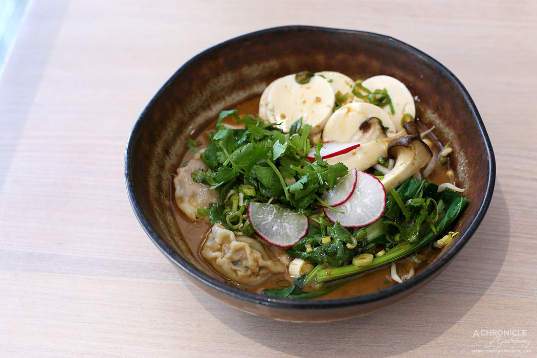 Momo Dumpling + Tea - Wonton tofu bowl w steamed silken tofu, vegetables, soy sesame sauce ($18.90)