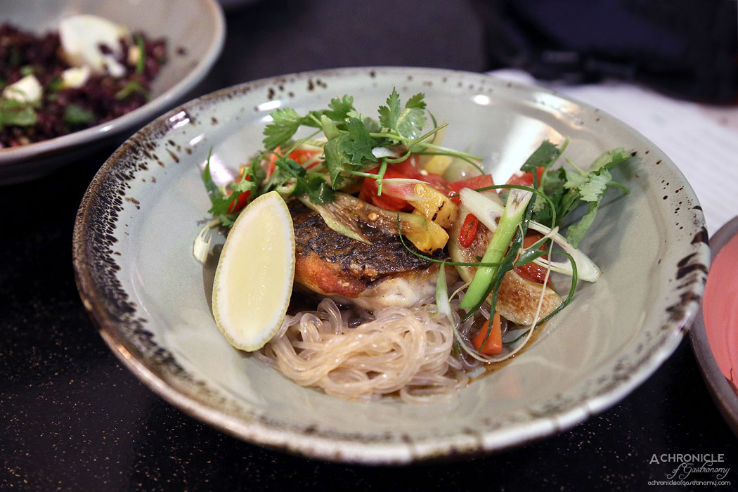 Uncle - Pan seared barramundi w glass noodles, tamarind caramel, tomato and grilled pineapple salad ($34)