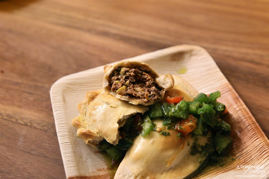 CHE - Traditional beef w minced Gippsland beef, green olives, currants and egg, smoked chicken empanada ($5 ea)
