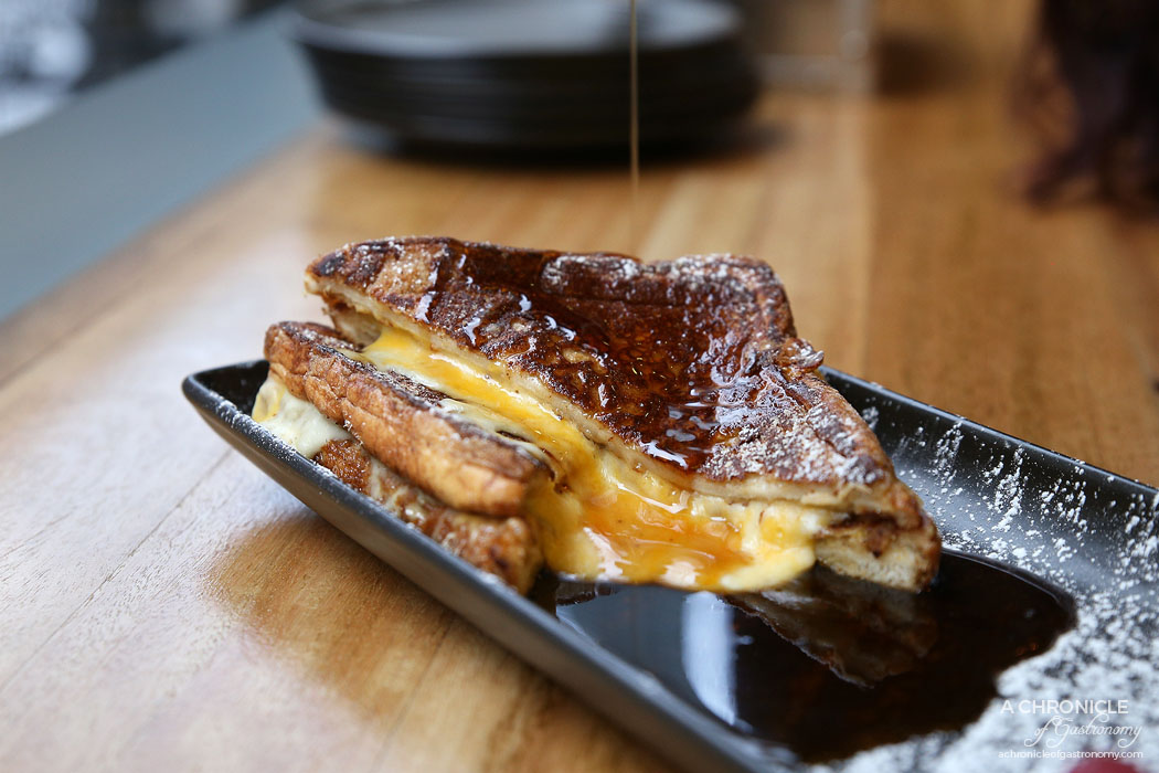 Brooklyn Depot - French Toast Grilled Cheese - Thick cut sweet French toast grilled with cheese and served with a side of maple syrup ($15)