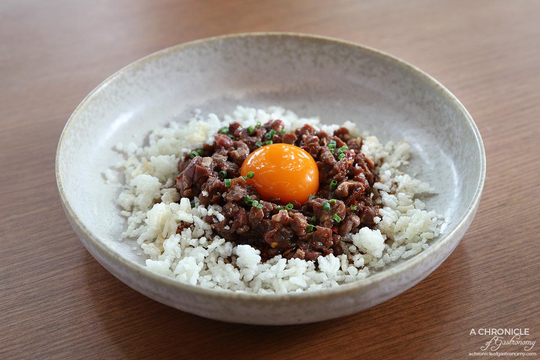 Jamu - Raw Beef w smoked egg, chilli oil, laughing cow, puffed rice ($20)