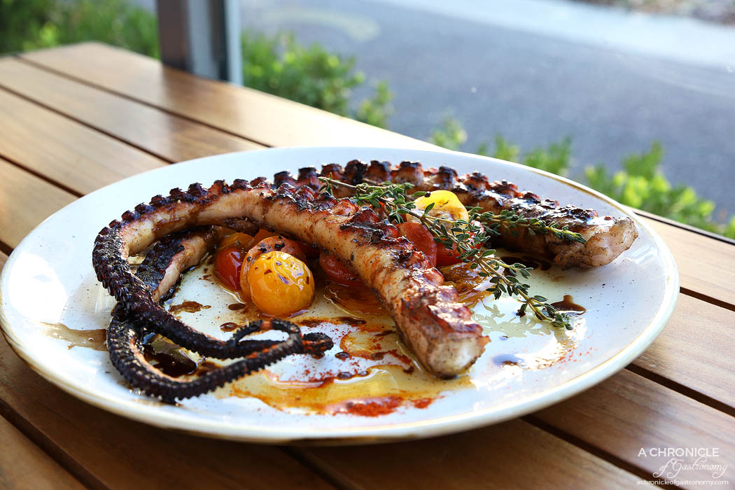 Koy - Mediterranean chargrilled octopus w balsamic cream & cherry tomatoes ($21)
