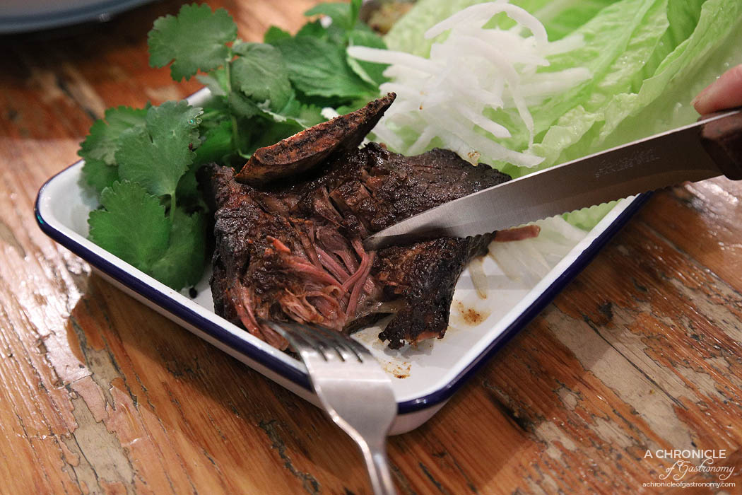 Queen Vee's - Miso & Tamarind Glazed Short Ribs w. green tomato pickle, pickled cucumber & lettuce cups ($24)