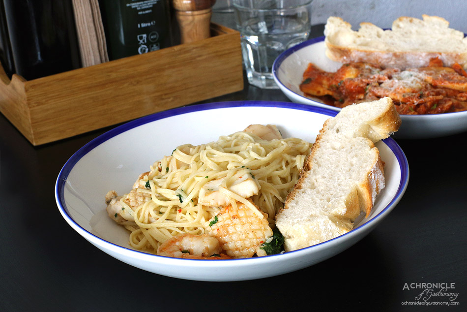 Sauced - Marinara Aglio Olio spaghetti w scallops, prawns, calamari and white fish ($25)