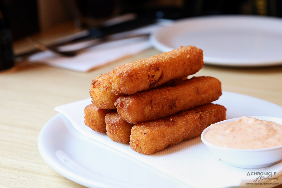 Woodfire Pizzeria - Semolina chips - deep fried cheese filled semolina chips served w spicy aioli ($8)