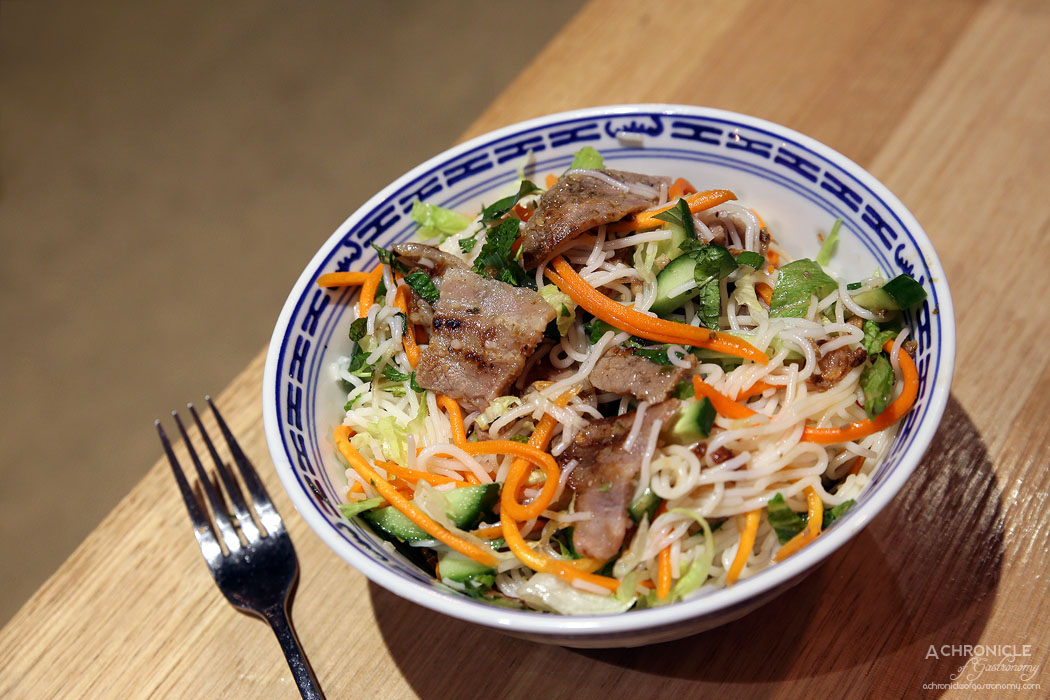 Hawker Boys - Grilled Lemongrass Pork Belly Vermicelli Salad w rice noodles, pickled carrots, shredded lettuce, cucumber, fried shallots, spring onion, coriander, fresh herbs, sweet and salty fish sauce ($12)