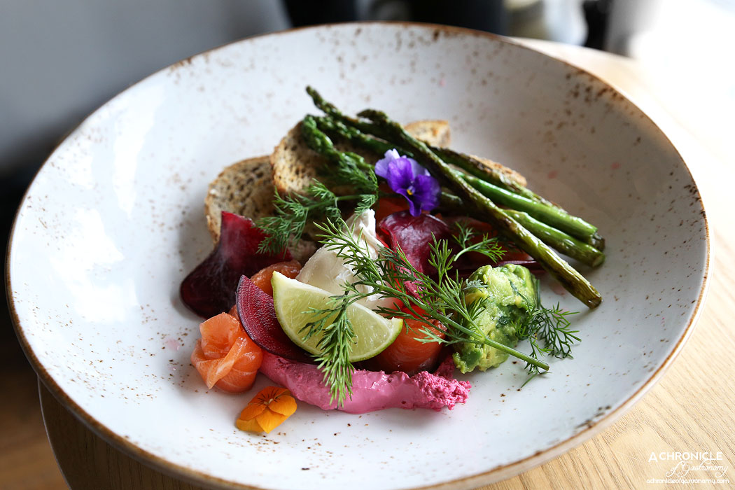 Prospect Espresso - House dill and citrus cured trout w grilled asparagus, smashed avocado, radish, poached egg, multigrain toast, beetroot goats cheese curd ($18.50)