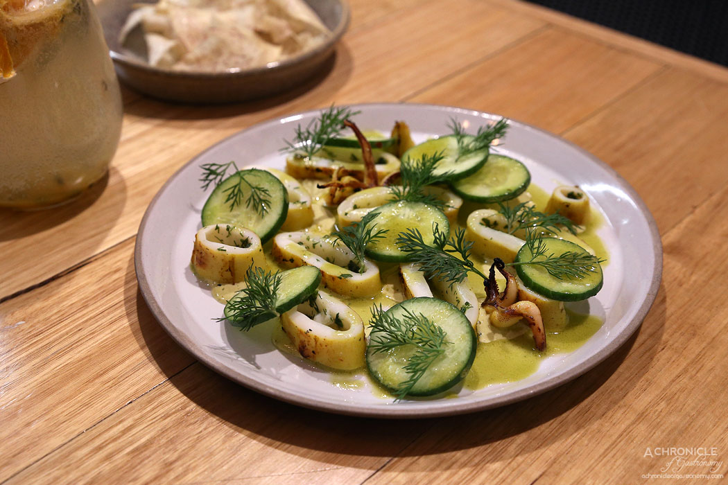 An Uong - Spiced Turmeric Squid - Grilled squid w turmeric, cucumber, lemon served w dill mayo ($14)