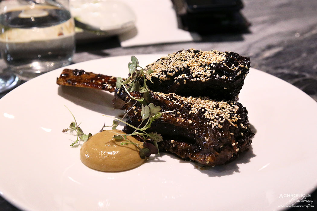 Pure South Downstairs - Sticky King Island beef short rib, ginger, and sesame, with crispy wonton and coconut rice
