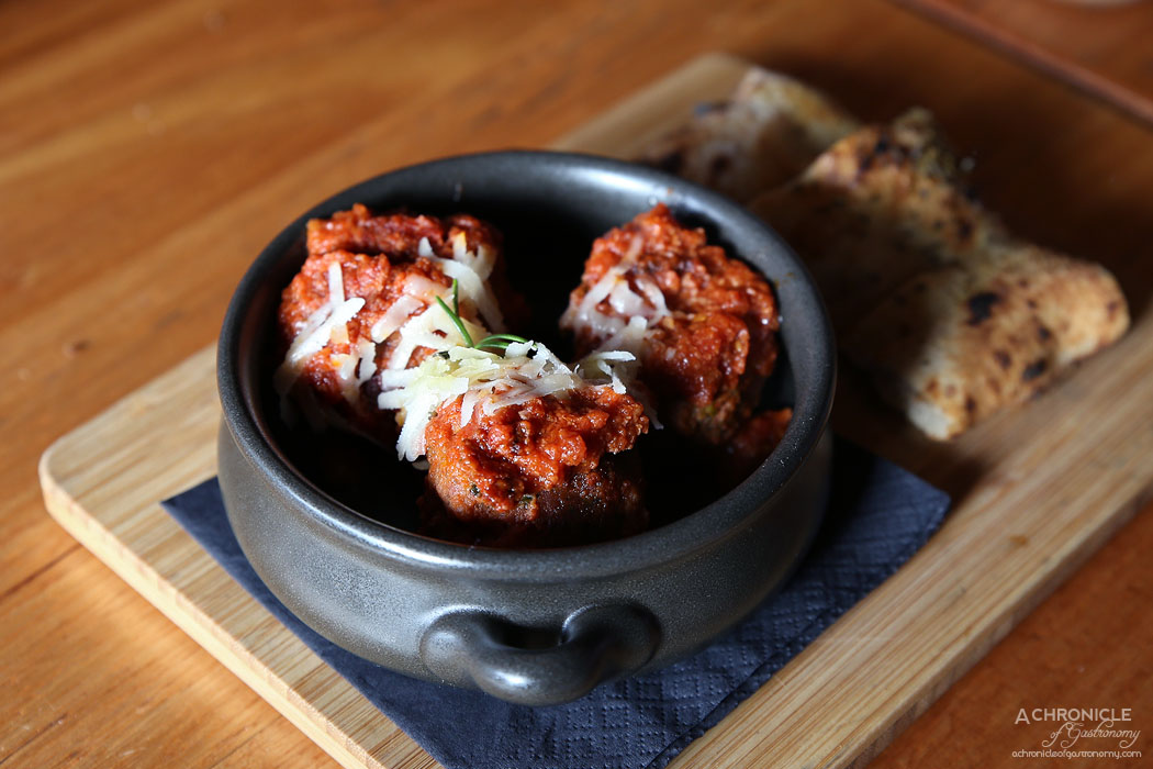 Mother Dough - Homemade Black Angus Wagyu Meatballs served in Napoli sauce with homemade focaccia ($17)