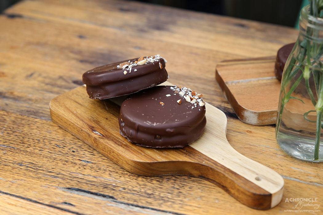 Buenos Dias - Alfajores - Latin American cookie filled w house made dulce de leche and covered in chocolate