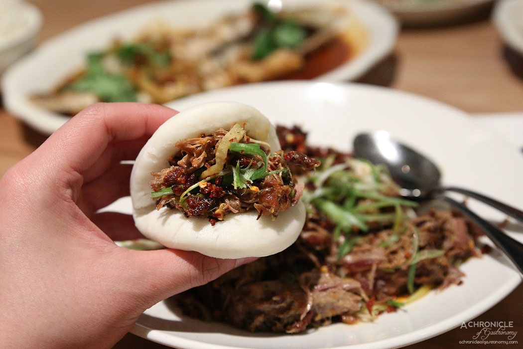 Ricky and Pinky - Shredded cumin lamb, crispy chilli, cucumber pickle and steamed bao