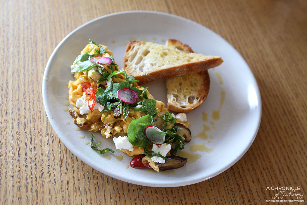 Mary Miller - Chilli Scrambled Eggs - Fried chilli and scrambled egg on toast, shiitake mushrooms, basil and chilli infused olive oil, crispy shallots goats cheese and fresh mint ($18)