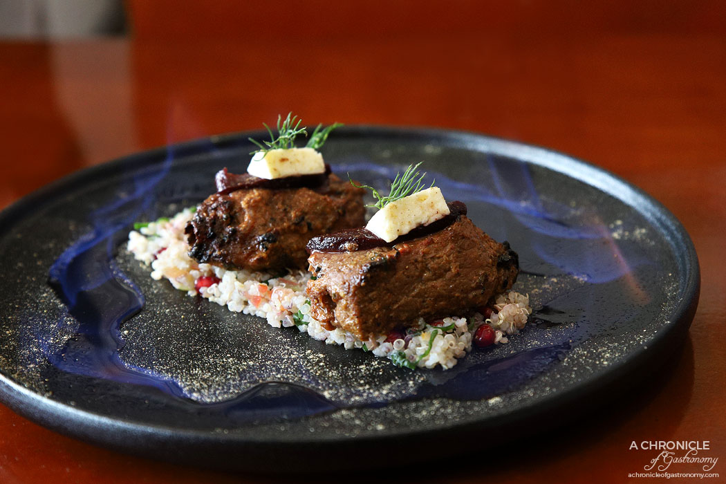 Fork and Fingers - Boti on Fire - Indian herbed lamb chunks, red wine poached pear and quinoa salad ($19)