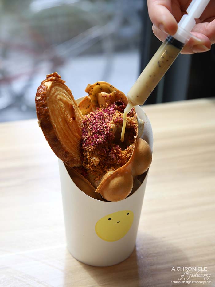 Pufflets - Duchess of Earl - Earl grey puffle w salted caramel gelato, rose petals, caramelised cookie crumbs, French palmier and earl grey drizzle (Mini $8)
