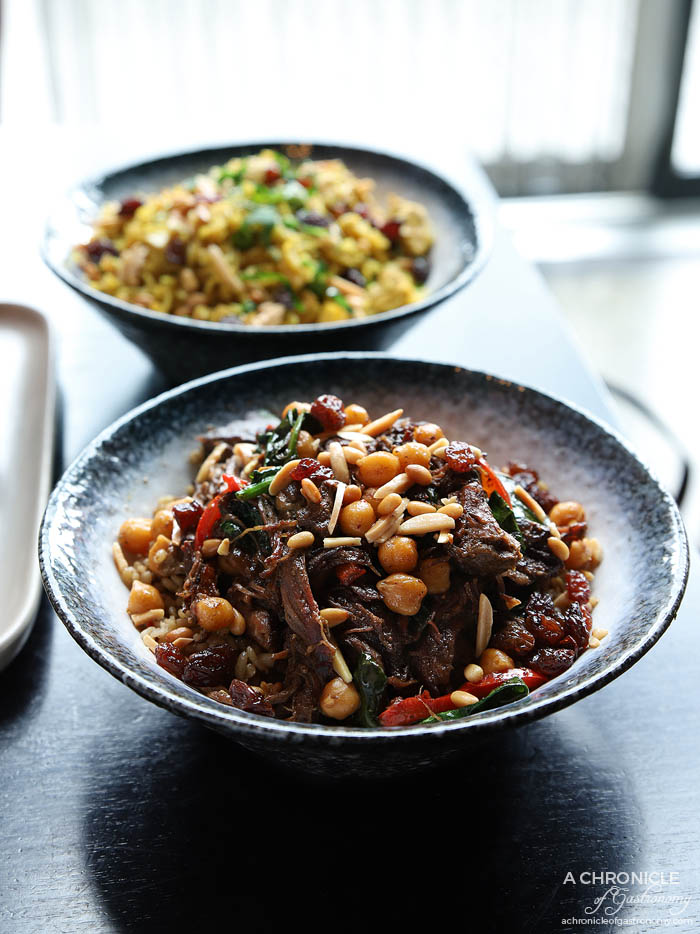 Mama Rumaan - Qouzi - Slow cooked lamb shoulder, pomegranate, traditional herbs and spices, wheat and chickpeas (small, $19)