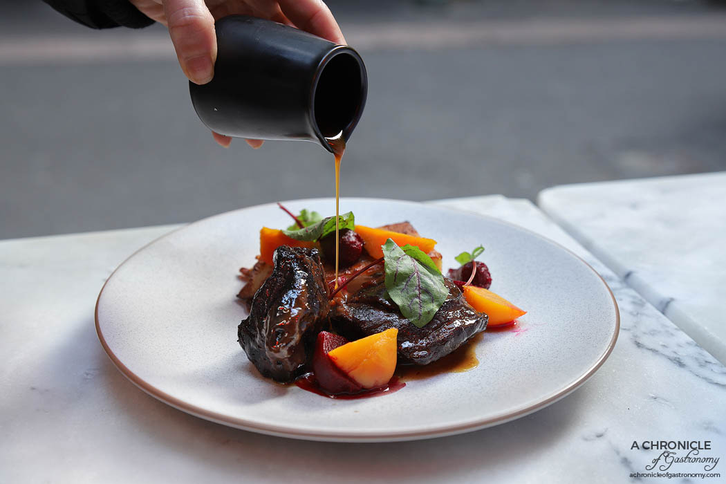 Ten Square - Glazed beef cheek - Pomme anna, pomegranate jus, pickled baby beetroot ($26)