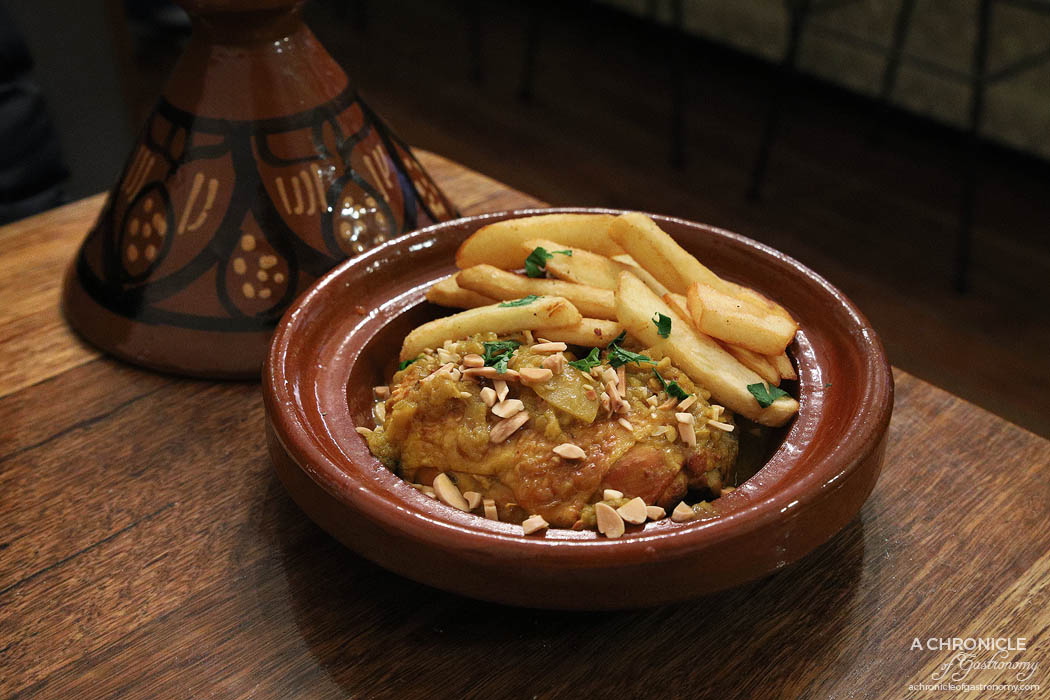 Casa Tajine - Chicken Tajine with Preserved Lemon - Marinated overnight in seven spices and cinnamon, with olive oil, onions, fresh ginger, preserved lemon, coriander and olives ($18)