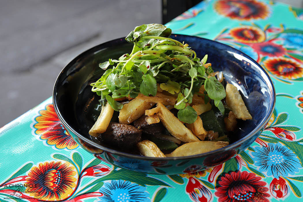Good Nights - Roo Luc Lac - wok tossed kangaroo fillet, onion, shishito peppers, watercress, basil and hand cut potato chips ($26)