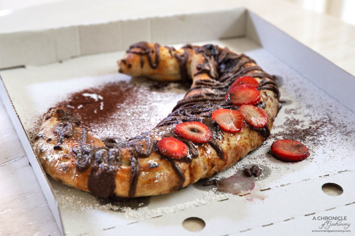 St Domenico - Calzone Fragola - Strawberries topped, chocolate and icing sugar ($18)